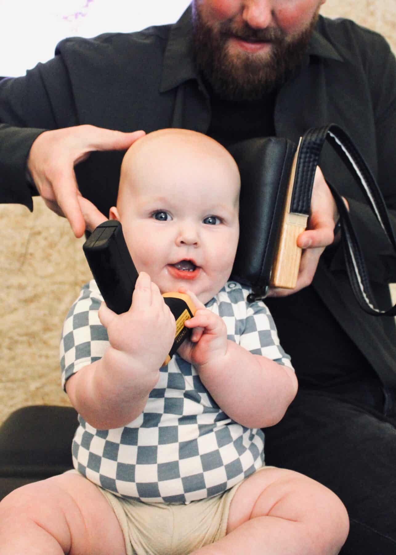 Photo of a baby receiving a chiropractic assessment