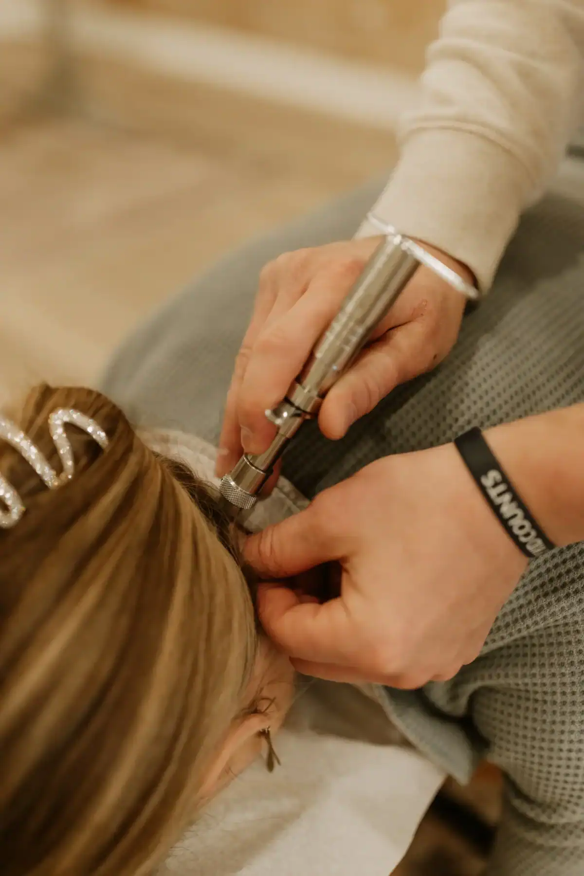 photo of a chiropractic care for teens appointment with a chiropractor working on a girl's neck